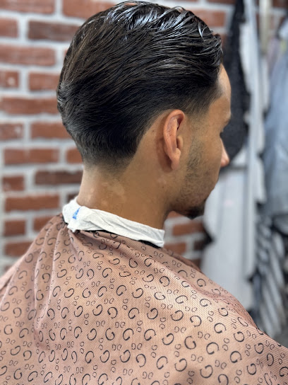 Barber Qerim, Barbier à Saint-Genis-Pouilly